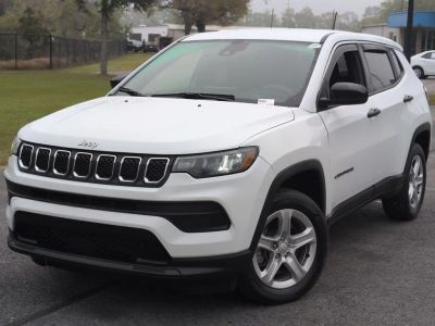 2023 Jeep Compass Sport in White — front three-quarter view