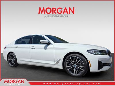 2023 BMW 5 Series 540i xDrive in White — front three-quarter view