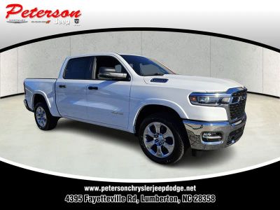 2026 RAM Ram 1500 RAM 1500 LONE STAR CREW CAB 4X2 5'7' BOX in Bright White Clear-Coat Exterior Paint — front three-quarter view