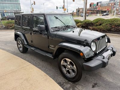 2016 Jeep Wrangler — rear three-quarter view