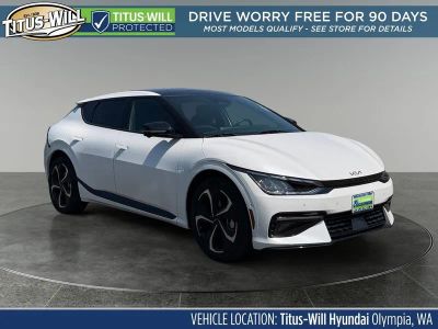 2024 Kia EV6 GT-Line in Snow White Pearl — front three-quarter view