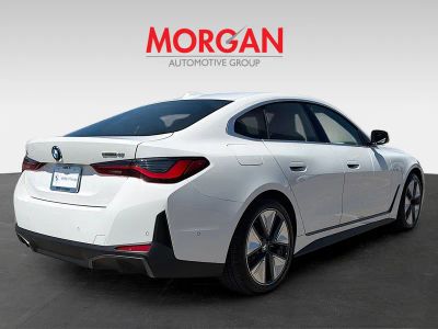 2026 BMW i4 — rear three-quarter view