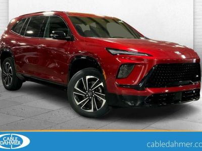2026 Buick Enclave Sport Touring in Cherry Red Tintcoat — front three-quarter view