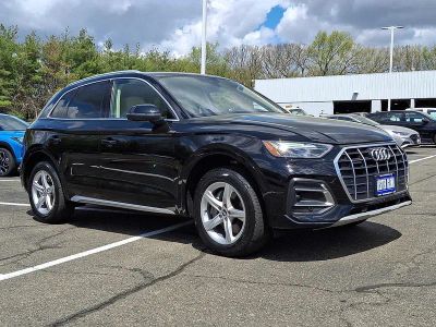2021 Audi Q5 Premium in Brilliant Black — front three-quarter view