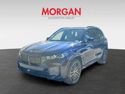 2026 BMW X5 — rear three-quarter view