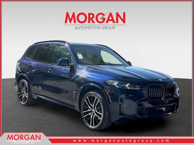 2026 BMW X5 sDrive40i in Tanzanite Blue II Metallic — front three-quarter view