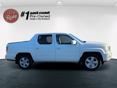 2013 Honda Ridgeline — rear three-quarter view