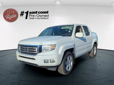 2013 Honda Ridgeline — front three-quarter view
