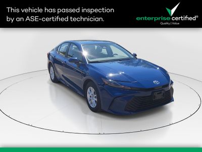 2025 Toyota Camry LE — front three-quarter view