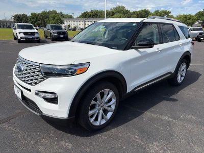 2024 Ford Explorer PLATINUM 4WD in Star White Metallic Tri-Coat — front three-quarter view