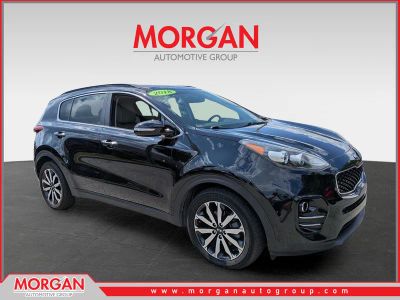2018 Kia Sportage EX in Black Cherry — front three-quarter view