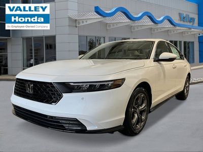 2026 Honda Accord Hybrid EX-L in Platinum White Pearl — front three-quarter view