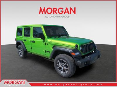 2026 Jeep Wrangler Sport S in Green — front three-quarter view
