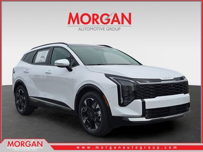 2026 Kia Sportage SX-Prestige in Glacial White Pearl — front three-quarter view
