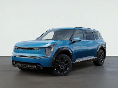 2026 Kia EV9 LAND in Ocean Blue — front three-quarter view