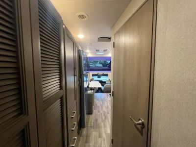 2027 Thor Motor Coach MAGNITUDE GRAND — rear three-quarter view