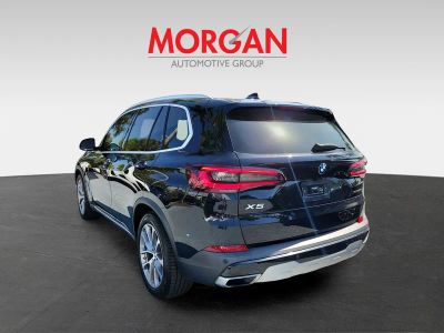2021 BMW X5 — rear three-quarter view