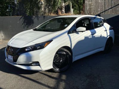 2023 Nissan LEAF SV PLUS in Whi/White — front three-quarter view