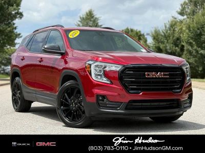 2023 GMC Terrain SLT in Volcanic Red — front three-quarter view