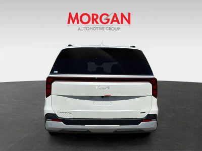 2026 Kia Carnival Hybrid — rear three-quarter view