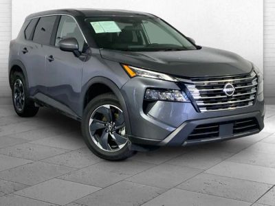 2025 Nissan Rogue SV in Gun Metallic — front three-quarter view