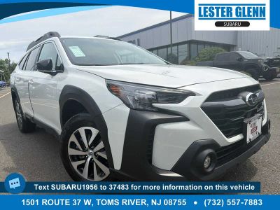 2025 Subaru Outback Premium in Crystal White Pearl — front three-quarter view