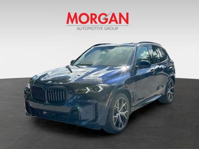 2026 BMW X5 — rear three-quarter view