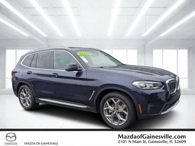 2022 BMW X3 sDrive30i in Blue — front three-quarter view