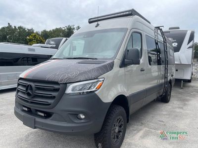 2023 Outside Van Approach — rear three-quarter view