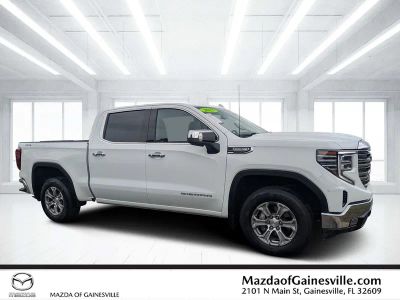 2025 GMC Sierra 1500 SLT in White — front three-quarter view