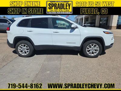 2014 Jeep Cherokee — rear three-quarter view