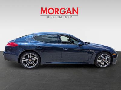 2015 Porsche Panamera — rear three-quarter view