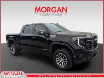 2023 GMC Sierra 1500 AT4 in Black — front three-quarter view