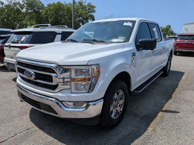 2023 Ford F-150 XLT in White — front three-quarter view