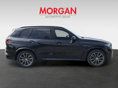 2025 BMW X5 — rear three-quarter view