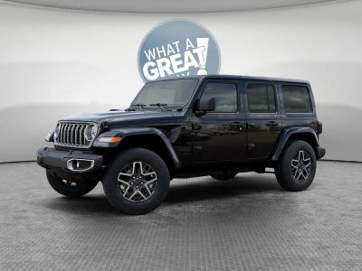 2026 Jeep Wrangler — rear three-quarter view