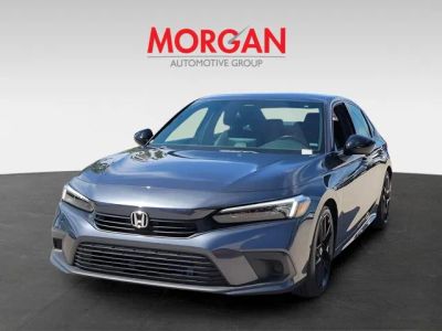 2024 Honda Civic Sedan — rear three-quarter view