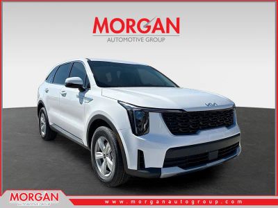 2026 Kia Sorento LX in Glacial White Pearl — front three-quarter view