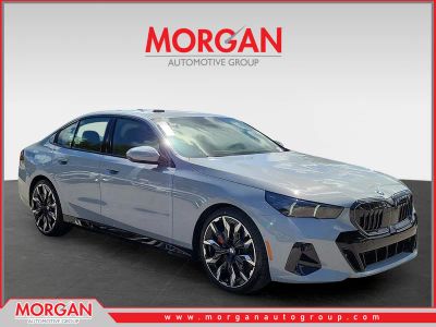 2026 BMW 5 Series 540i xDrive in Brooklyn Grey Metallic — front three-quarter view