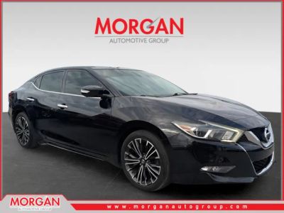 2016 Nissan Maxima Platinum in Black — front three-quarter view