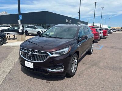 2021 Buick Enclave Avenir in Rich Garnet Metallic — front three-quarter view
