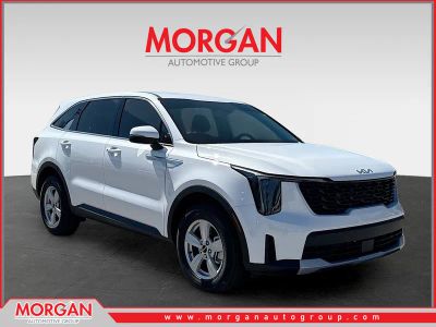 2026 Kia Sorento LX in Glacial White Pearl — front three-quarter view