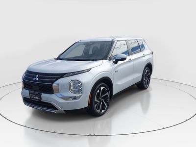 2024 Mitsubishi Outlander Plug-In Hybrid — rear three-quarter view