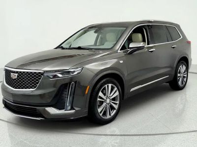 2020 Cadillac XT6 FWD Premium Luxury in Dark Mocha Metallic — front three-quarter view