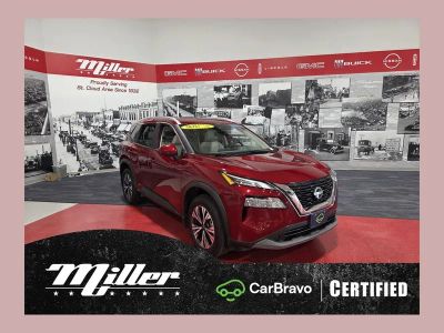 2023 Nissan Rogue SV in Scarlet Ember Tintcoat — front three-quarter view