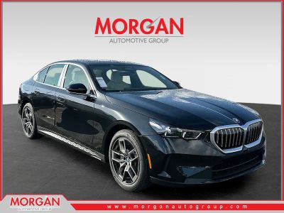 2026 BMW 5 Series 530i in Black — front three-quarter view