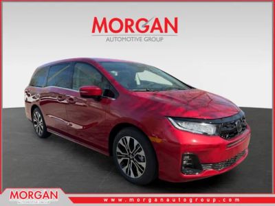 2026 Honda Odyssey Elite in Red — front three-quarter view