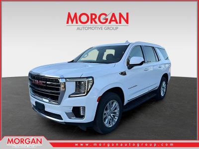 2023 GMC Yukon SLT in Summit White — front three-quarter view