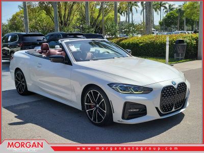 2021 BMW 4 Series 430i in Mineral White Metallic — front three-quarter view