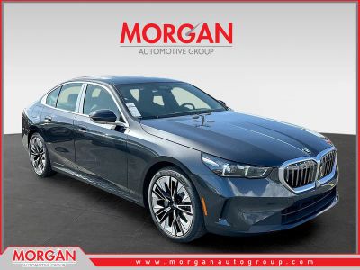 2026 BMW 5 Series 530i in Gray — front three-quarter view